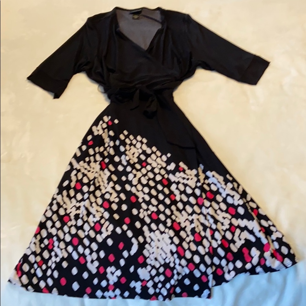 Black and pink jersey knit wrap dress